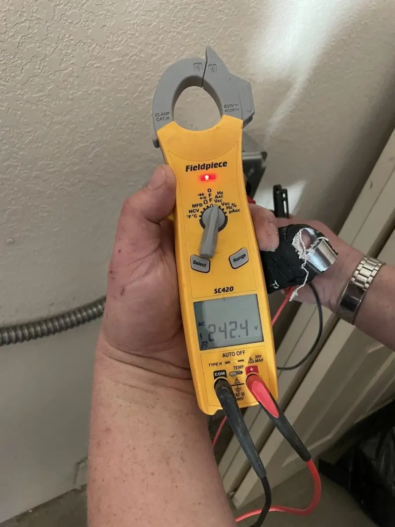 Voltage testing with clamp meter during Generator Installation in The Acreage